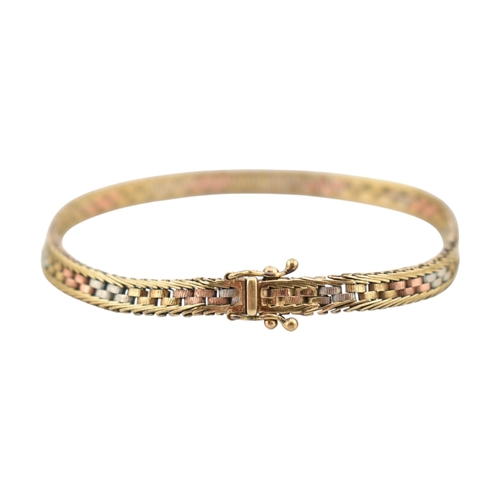 185 - A 9ct gold tri-colour bracelet. Set with push clasp. Stamped 9k. Weight 9.8g. Measures 16cm