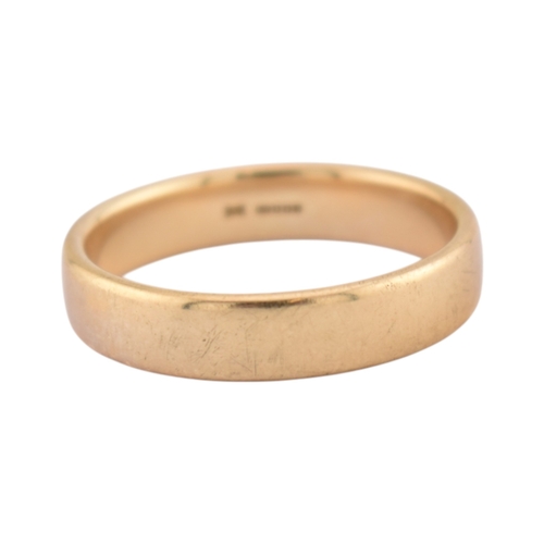 187 - A hallmarked 9ct gold band ring. Hallmarked London. Sponsors mark W&Co. Total weight 6g