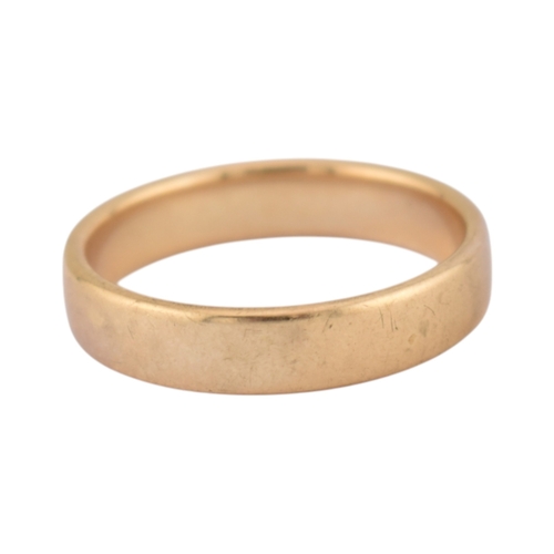 187 - A hallmarked 9ct gold band ring. Hallmarked London. Sponsors mark W&Co. Total weight 6g