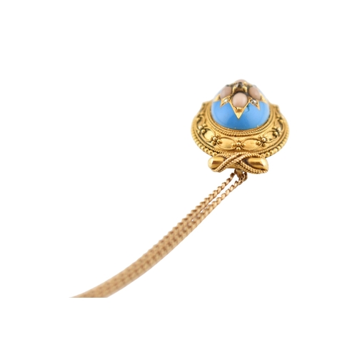 190 - A Victorian 19th century gold Etruscan revival enamel, pearl and diamond pendant and chain. The oval... 