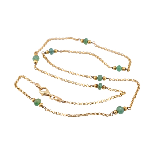 193 - A 14ct gold and emerald bead necklace. Stamped 14k. Weight 5.1g. Measures 42cm