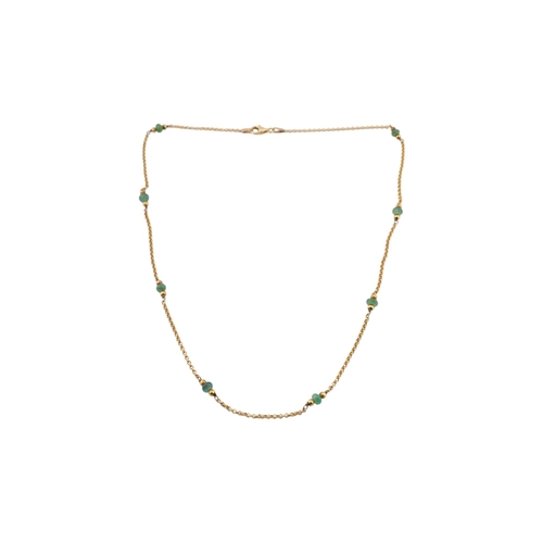 193 - A 14ct gold and emerald bead necklace. Stamped 14k. Weight 5.1g. Measures 42cm
