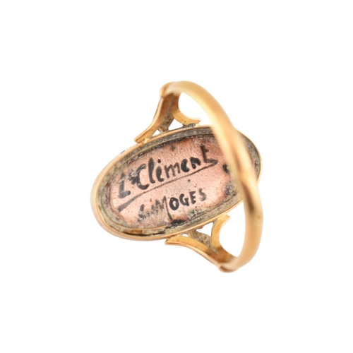 198 - An Art Nouveau 18ct gold French Limoges panel ring. The ring set with a Limoges enamel image of a ma... 