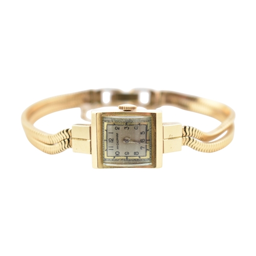 200 - A 14k gold ladies cocktail Hyde Park wristwatch. The wristwatch with Arabic number dial with domed s... 