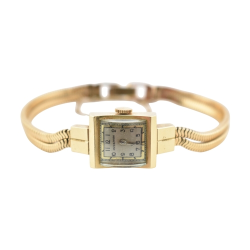 200 - A 14k gold ladies cocktail Hyde Park wristwatch. The wristwatch with Arabic number dial with domed s... 
