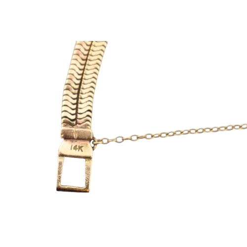 200 - A 14k gold ladies cocktail Hyde Park wristwatch. The wristwatch with Arabic number dial with domed s... 