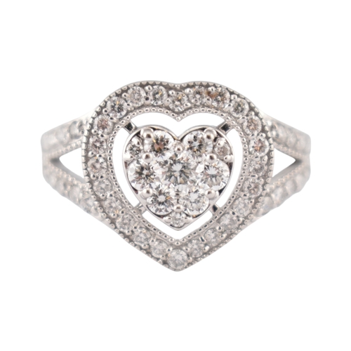 201 - A 14ct gold and diamond heart motif cluster ring. Estimated total diamond weight 1.25cts. Weight 4.4... 