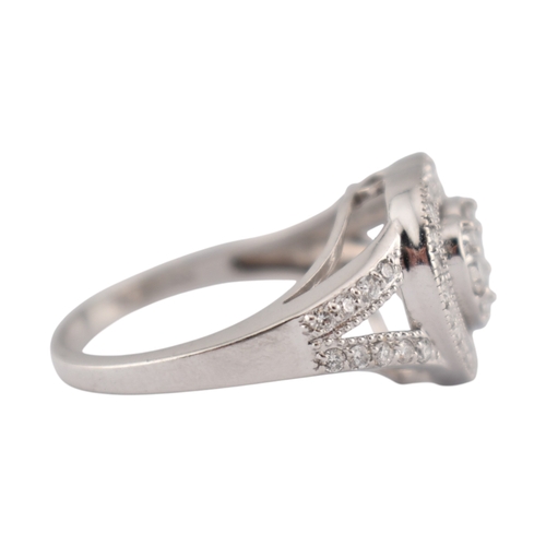 201 - A 14ct gold and diamond heart motif cluster ring. Estimated total diamond weight 1.25cts. Weight 4.4... 