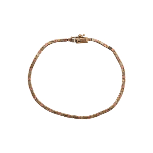 202 - A hallmarked 9ct gold tri-colour bracelet. The bracelet with fancy box linkage. Weight 4.8g. Measure... 