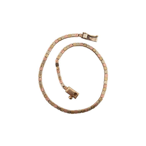202 - A hallmarked 9ct gold tri-colour bracelet. The bracelet with fancy box linkage. Weight 4.8g. Measure... 