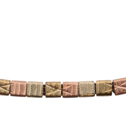 202 - A hallmarked 9ct gold tri-colour bracelet. The bracelet with fancy box linkage. Weight 4.8g. Measure... 