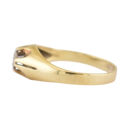 207 - A 14ct gold and diamond solitaire ring. The ring set with a single diamond in a pierced mount. Stamp... 