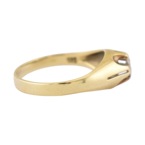 207 - A 14ct gold and diamond solitaire ring. The ring set with a single diamond in a pierced mount. Stamp... 
