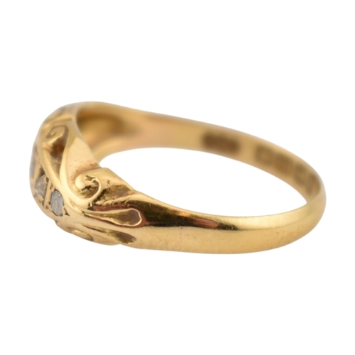 208 - An early 20th century hallmarked 18ct gold & diamond five stone boat ring. The ring set with fiv... 