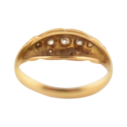 208 - An early 20th century hallmarked 18ct gold & diamond five stone boat ring. The ring set with fiv... 