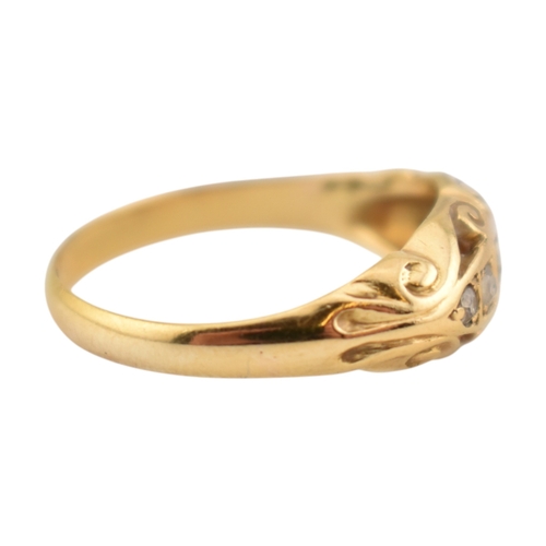 208 - An early 20th century hallmarked 18ct gold & diamond five stone boat ring. The ring set with fiv... 