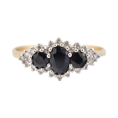 209 - Two 9ct gold sapphire and diamond cluster rings. Weight 5.2g. Both size T.