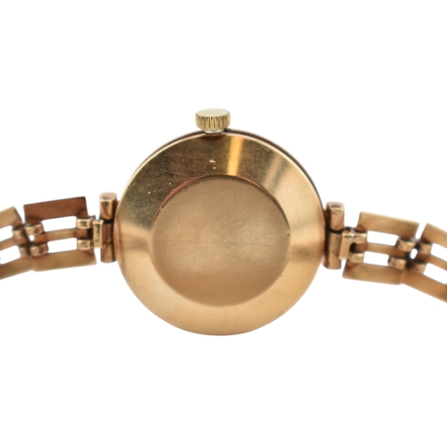 210 - A hallmarked 9ct gold Rotary ladies wristwatch. Set to a hallmarked 9ct gold strap. 2cm dial.Hallmar... 