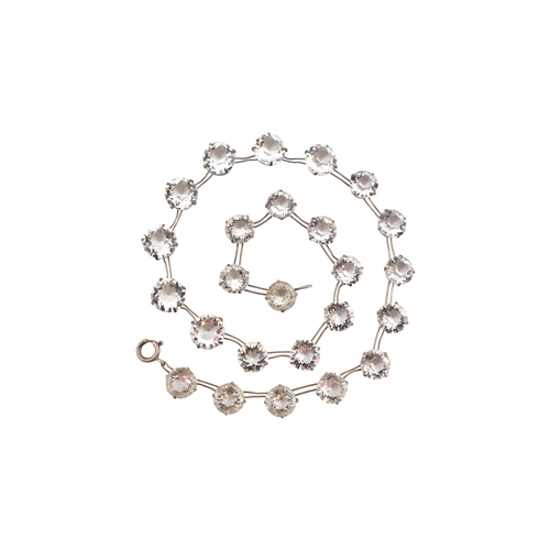 217 - An early 20th century silver and rhinestone riviere necklace. The necklace stamped 'pat app for' ste... 