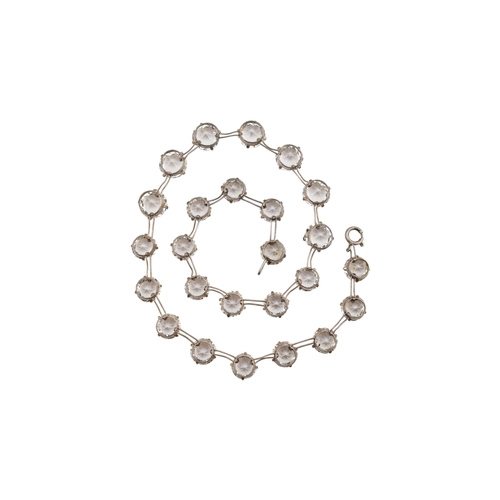 217 - An early 20th century silver and rhinestone riviere necklace. The necklace stamped 'pat app for' ste... 