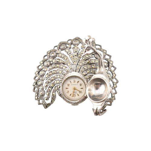220 - A vintage novelty Lunesa Geneve 17 jewel silver brooch watch. The novelty watch in the form of a pea... 