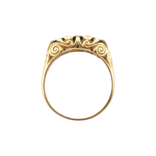 222 - An 18ct gold sapphire and diamond three stone ring. Stamped 18ct. Weight 4.8g. Size P