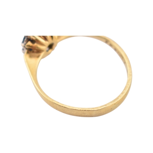 227 - A hallmarked 18ct gold sapphire and diamond cluster ring. Hallmarked Birmingham. Weight 2.7g. Size O... 