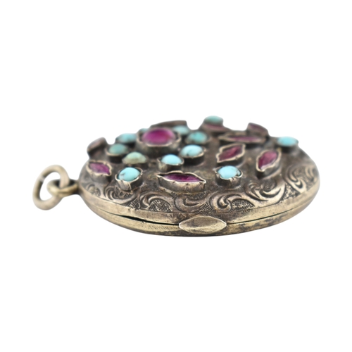 228 - Garnet & turquoise Austro-Hungarian locket pendant. The pendant set with garnet and turquoise wi... 