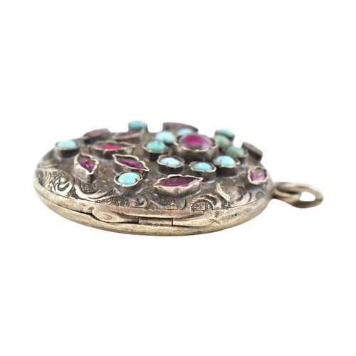 228 - Garnet & turquoise Austro-Hungarian locket pendant. The pendant set with garnet and turquoise wi... 