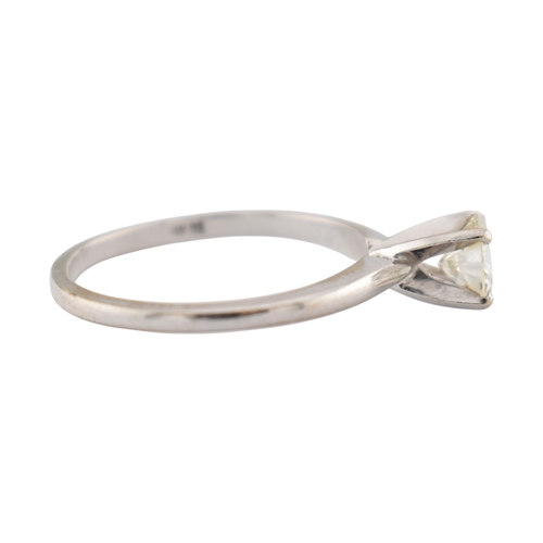 235 - A 14ct white gold and diamond solitaire ring. The ring set with a single round brilliant cut diamond... 