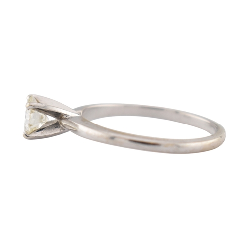 235 - A 14ct white gold and diamond solitaire ring. The ring set with a single round brilliant cut diamond... 