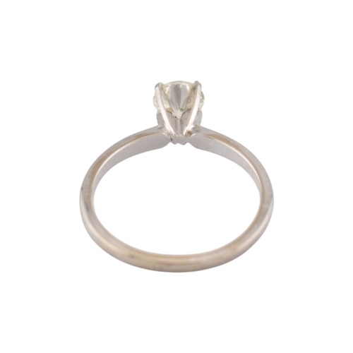 235 - A 14ct white gold and diamond solitaire ring. The ring set with a single round brilliant cut diamond... 
