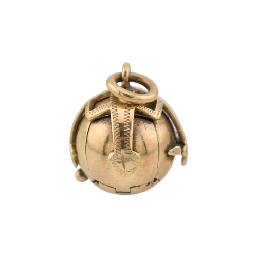 236 - A gold on silver masonic orb pendant with articulated action to cross pendant. Stamped HJ&S Made... 