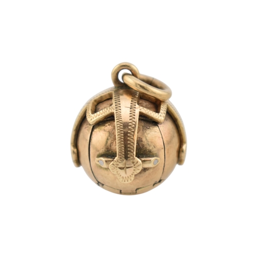 236 - A gold on silver masonic orb pendant with articulated action to cross pendant. Stamped HJ&S Made... 