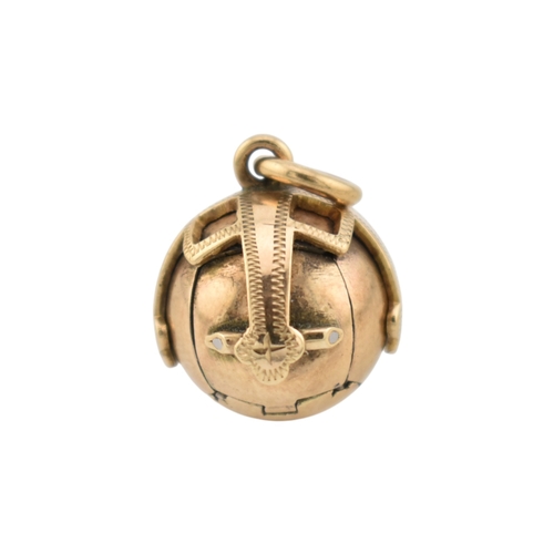 236 - A gold on silver masonic orb pendant with articulated action to cross pendant. Stamped HJ&S Made... 