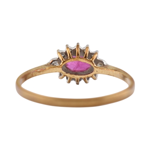 239 - A hallmarked 9ct gold ruby and diamond halo ring. Weight 1.9g. Size U