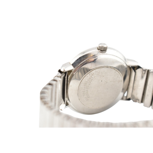 240 - Omega De Ville Automatic stainless steel wristwatch. Silvered dial with baton markers, date aperture... 