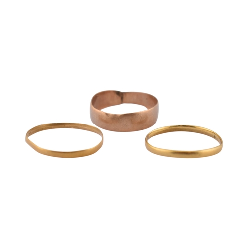303 - Three gold band rings. To include a hallmarked band ring. The other two marks worn. Weight 1.8g.... 