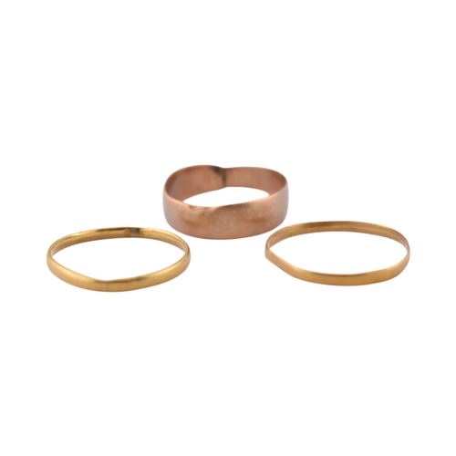 303 - Three gold band rings. To include a hallmarked band ring. The other two marks worn. Weight 1.8g.... 
