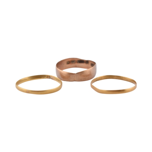 303 - Three gold band rings. To include a hallmarked band ring. The other two marks worn. Weight 1.8g.... 