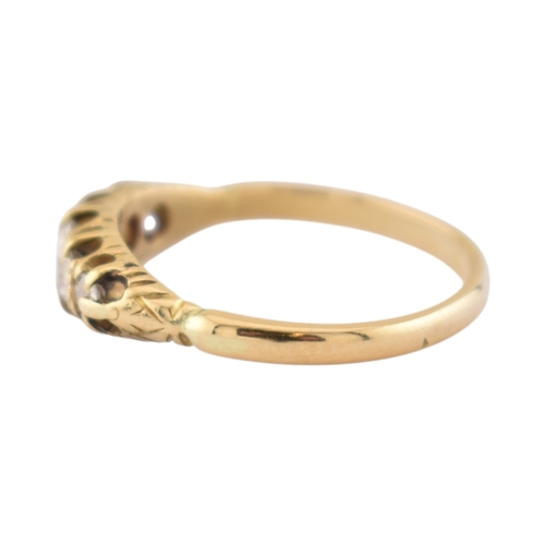 305 - An 18ct gold and diamond five stone ring. Unmarked, tests indicate 18ct gold. Weight 2.8g. Size P... 