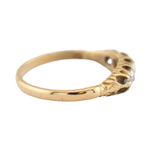 305 - An 18ct gold and diamond five stone ring. Unmarked, tests indicate 18ct gold. Weight 2.8g. Size P... 