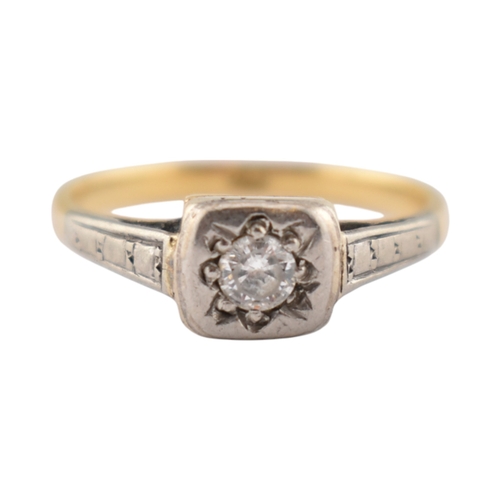 306 - An early 20th century 18ct gold white stone solitaire ring. Stamped 18ct. Weight 2.2g. Size J