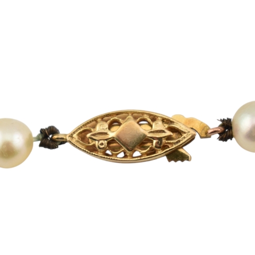 316 - A hallmarked 9ct gold and cultured pearl necklace. The necklace with ball clasp. Import hallmarked f... 