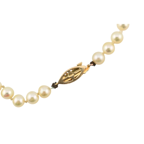 316 - A hallmarked 9ct gold and cultured pearl necklace. The necklace with ball clasp. Import hallmarked f... 