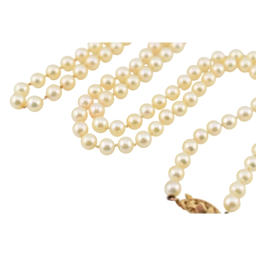 316 - A hallmarked 9ct gold and cultured pearl necklace. The necklace with ball clasp. Import hallmarked f... 