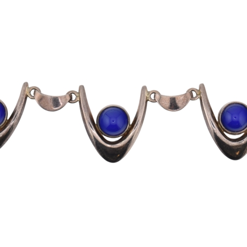 318 - Arne Johansen - A 1970s Danish modernist 925 sterling silver necklace and bracelet set. The necklace... 