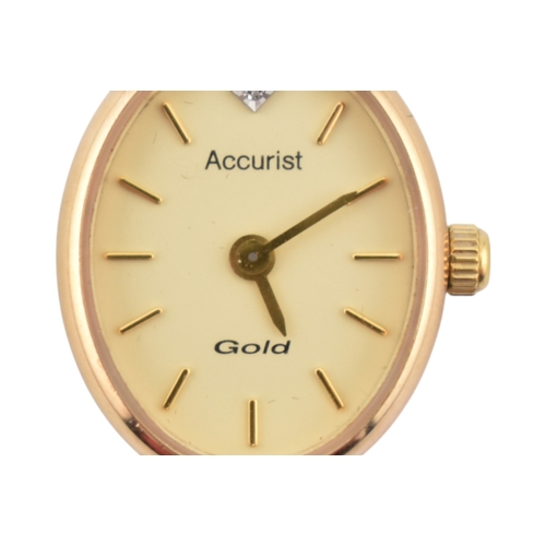 325 - A hallmarked 9ct gold Accurist ladies wristwatch. Set on a hallmarked 9ct pierced linked strap. Hall... 