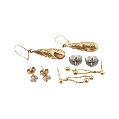 329 - Three pairs of yellow metal pendant earrings. Unmarked, tests indicate 9ct gold. Weight 3.5g.