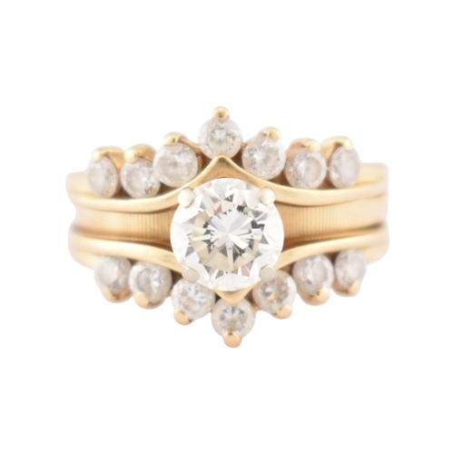 331 - A 14ct gold Diamonique CZ stacking ring. The ring in three parts all set with CZ. Stamped CZ DQ 14k.... 
